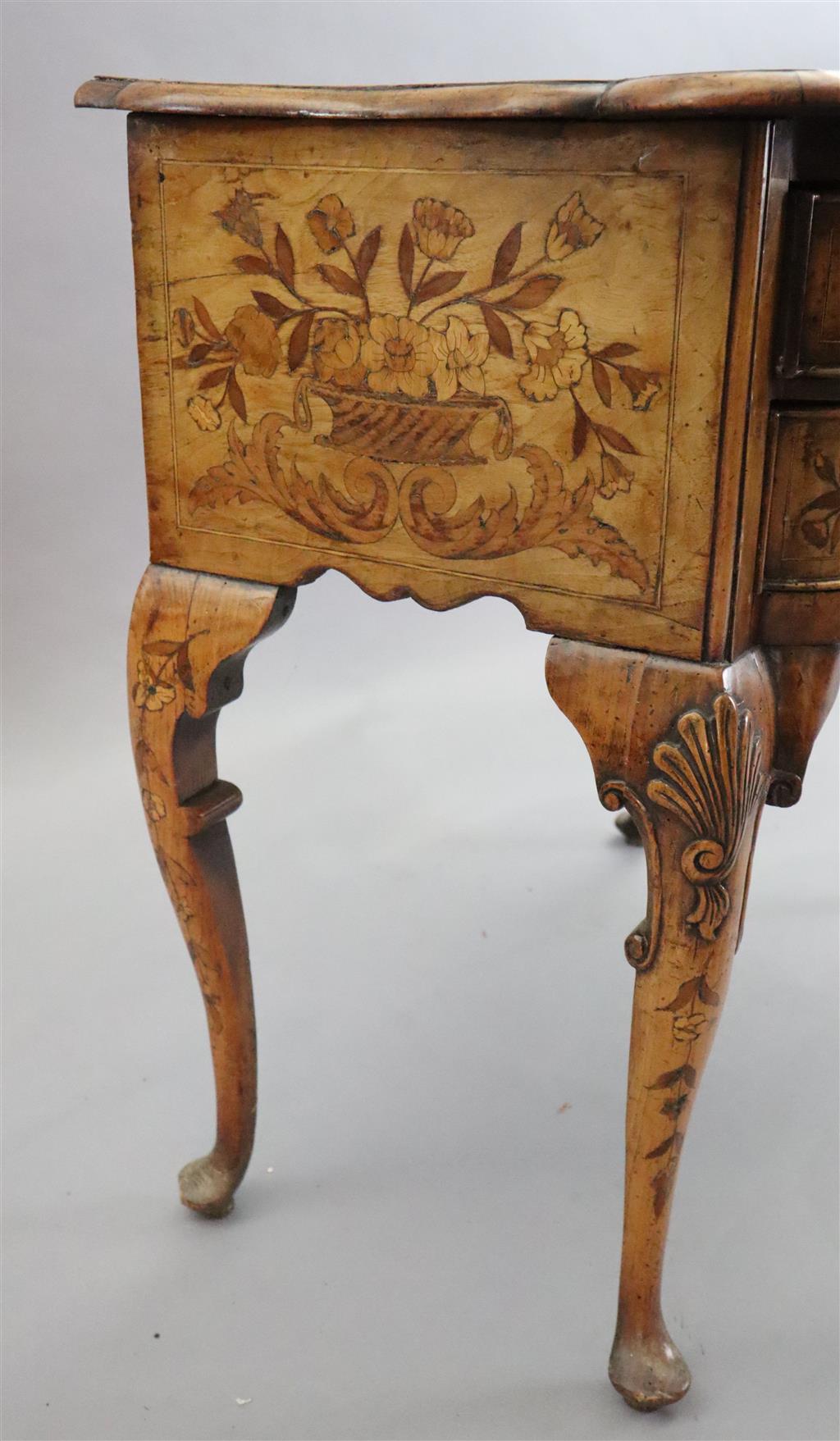 An 18th century Dutch and walnut marquetry lowboy, W.2ft 9in. D.1ft 8in. H.2ft 5in.